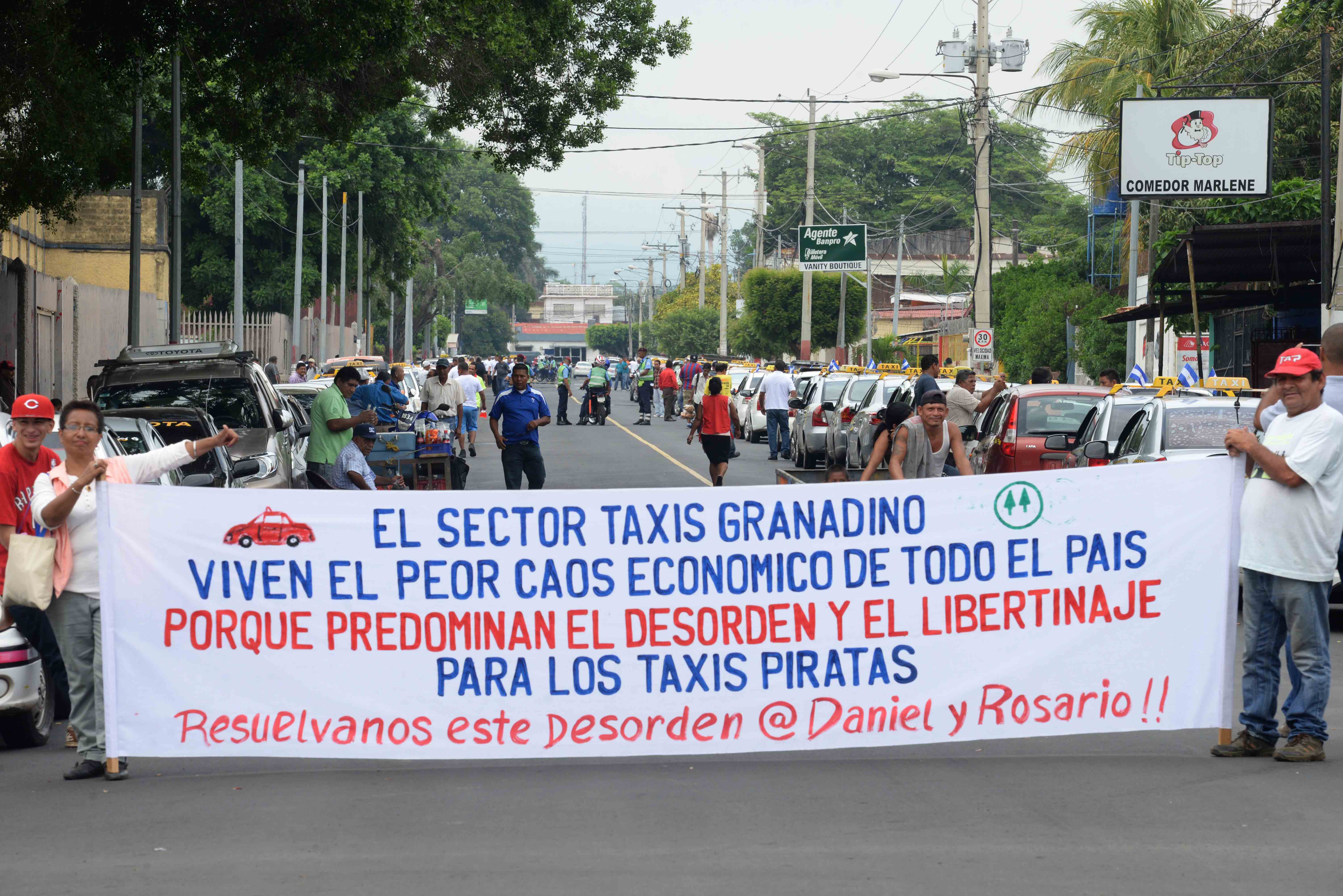 taxis, piratas, León, Granada