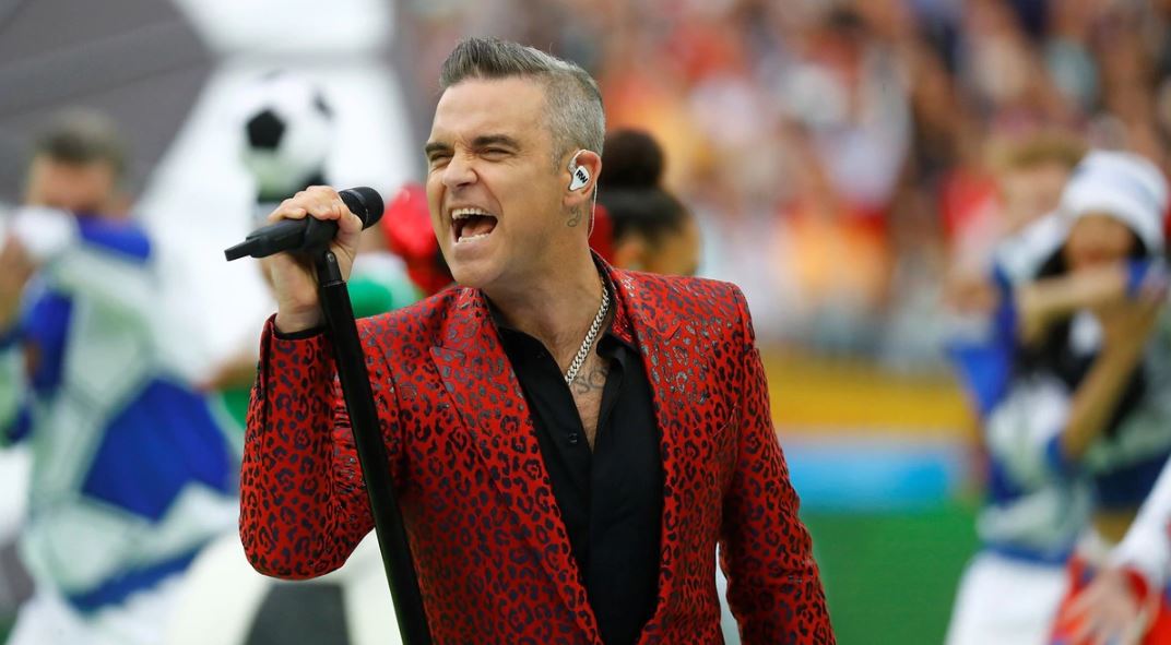 Robbie Williams pone la música a todo volumen para «atormentar» a Jimmy Page