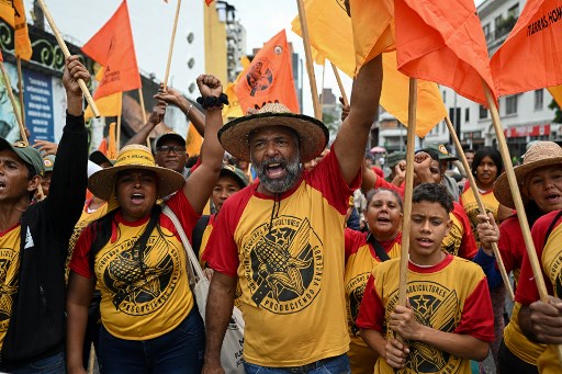Partidarios del gobierno chavista de Nicolás Maduro toman parte en un mítin para conmemorar la batalla de Santa Inés, el pasado 10 de diciembre, en Caracas. Federico PARRA / AFP)
