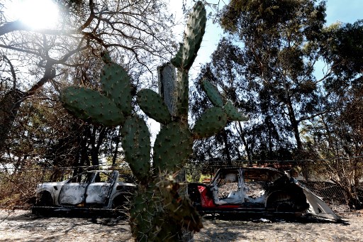 Estos carros fueron quemados para obstaculizar el avance de las tropas que cercaron e hirieron mortalmente al Mencho y sus guardaespaldas el domingo. Murieron mientras eran trasladados para recibir atención médica
