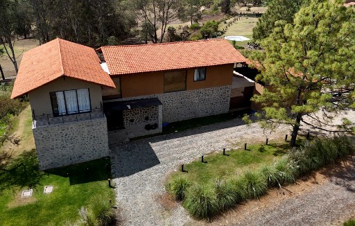 Vista aérea de la casa donde se hospedaba el narcotraficante mexicano el Mencho, antes de su captura en el Tapalpa Country Club, en Tapalpa, Jalisco