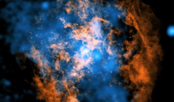 Esta imagen compuesta muestra evidencia de un viento que sopla alejándose de Sagitario A* (Sgr A*), el agujero negro supermasivo en el centro de nuestra galaxia. El punto blanco en el centro de la imagen muestra a Sgr A*. Rayos X: NASA/CXC/Northwestern Univ./M. Gorski; Radio: ESO/NAOJ/NRAO/ALMA; Procesamiento de imágenes: NASA/CXC/SAO/K. Arcand y P. Edmonds